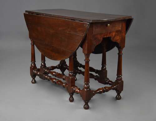 Rare early 18th century walnut gateleg table of fine patina
