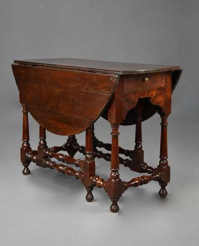Rare early 18th century walnut gateleg table of fine patina