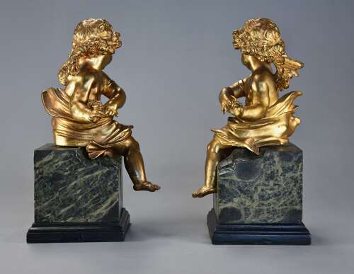 Pair of fine quality early 19thc French ormolu winged cherubs seated on faux marble bases