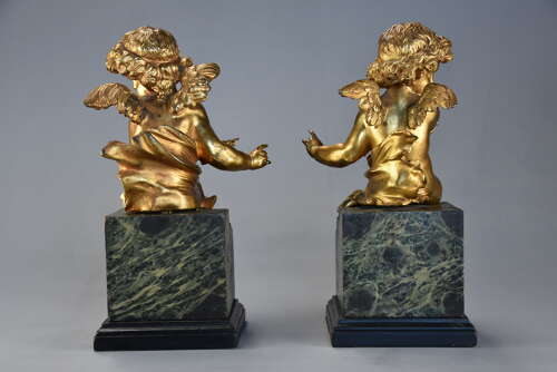 Pair of fine quality early 19thc French ormolu winged cherubs seated on faux marble bases