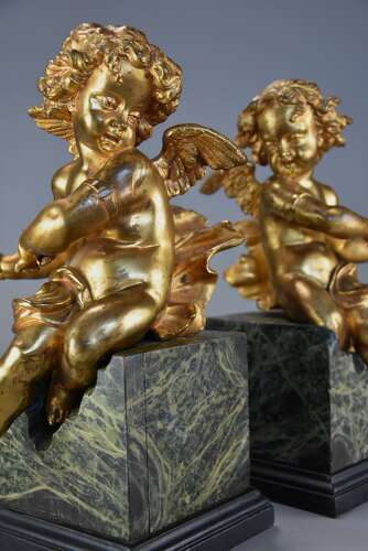 Pair of fine quality early 19thc French ormolu winged cherubs seated on faux marble bases