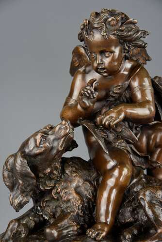 Charming late 19th century fine quality French bronze of a winged putto and spaniel dog