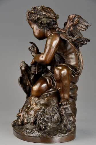 Charming late 19th century fine quality French bronze of a winged putto and spaniel dog