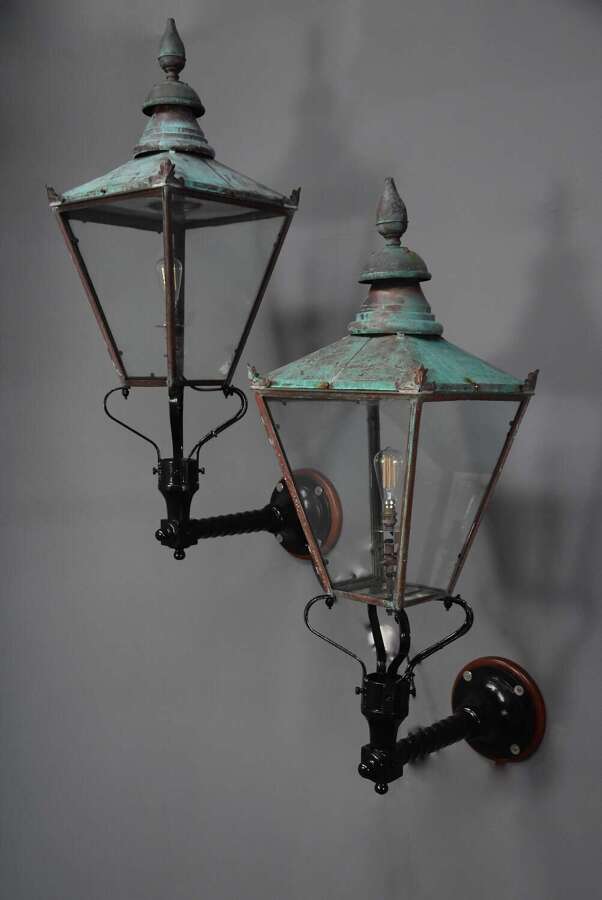 Large pair of Windsor style copper street lanterns supported on wall brackets