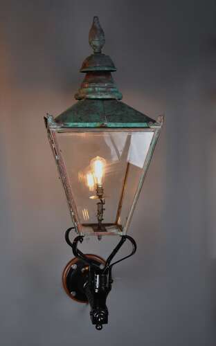 Large pair of Windsor style copper street lanterns supported on wall brackets