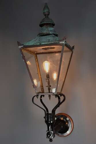 Large pair of Windsor style copper street lanterns supported on wall brackets
