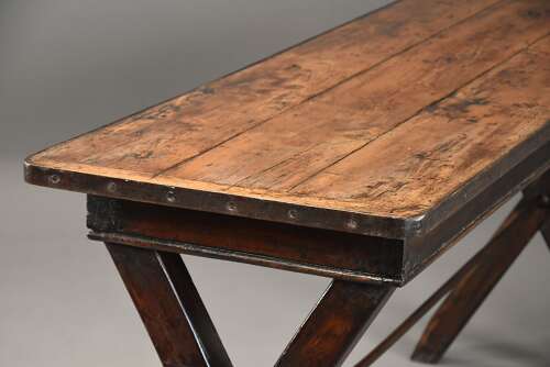 Early 19th century sycamore trestle ended tavern table of fine patina