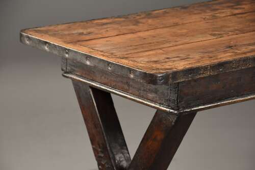 Early 19th century sycamore trestle ended tavern table of fine patina