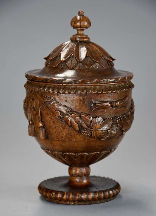 Late 18th century Neoclassical finely carved walnut lidded urn, possibly Italian