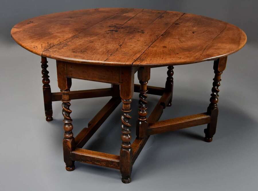 Rare late 17thc walnut gateleg table with unusual barley twist base & superb faded patina